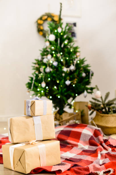 istock Beautiful Christmas interior design. Selective focus on gifts, o 997523398