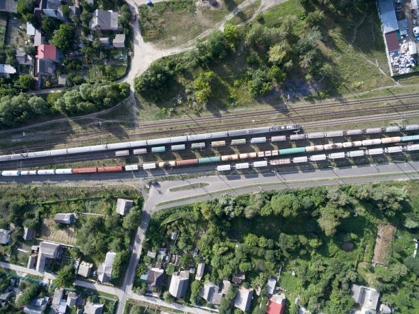 istock railway, trains with wagons, view from above 997524160