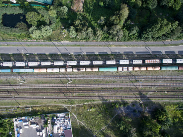 istock railway, trains with wagons, view from above 997524552