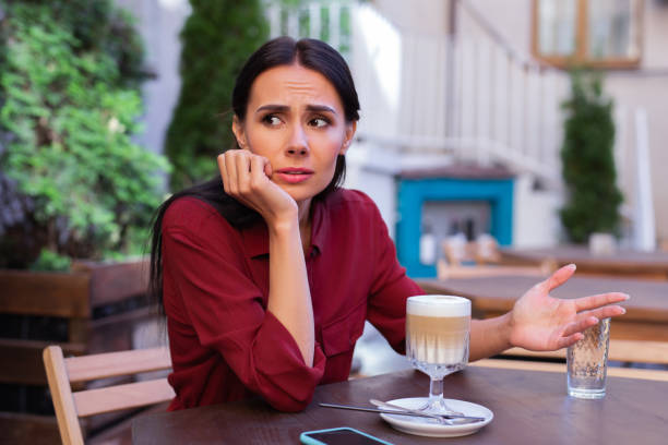 istock Businesswoman feeling emotional while having dispute with partner 997526690