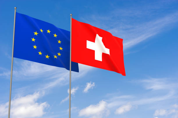 flagi unii europejskiej i szwajcarii na tle błękitnego nieba. - switzerland flag computer graphic digitally generated image zdjęcia i obrazy z banku zdjęć