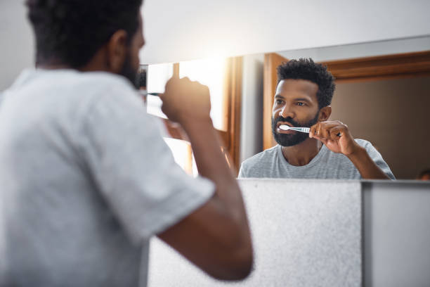 istock He's a firm believer in brushing twice a day 997536058