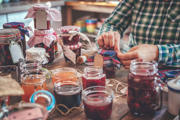 istock Preparing Homemade Strawberry, Blueberry and Raspberry Jam and Canning in Jars 997536146