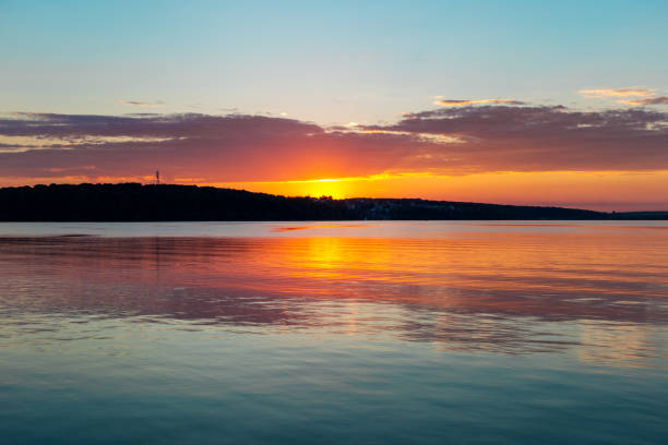 istock Gorgeous sunset on calm lake 997539854