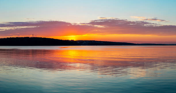 istock Gorgeous sunset on calm lake 997539868