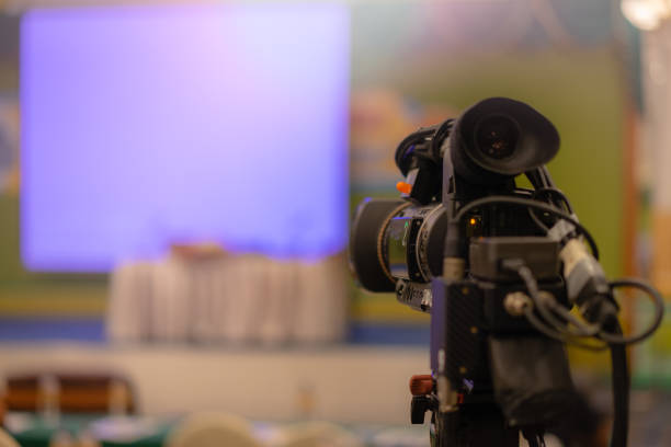 istock Video camera taking live video streaming with people working background at meeting room. 997539970