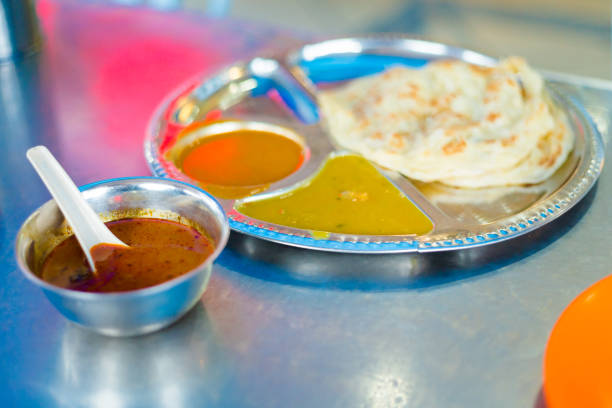 istock Malaysian roti and dhal set 997540578