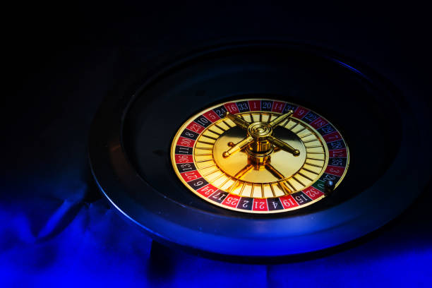 istock Casino playing roulette on green table 997545638