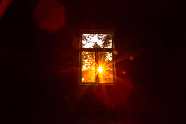 Sunset view in old window. Photo from Sotkamo.