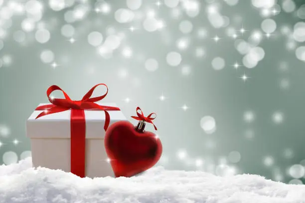 Photo of festive background with gift and heart shape