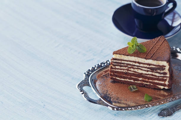 istock Slice of delicious chocolate cake on silver plate 997579592