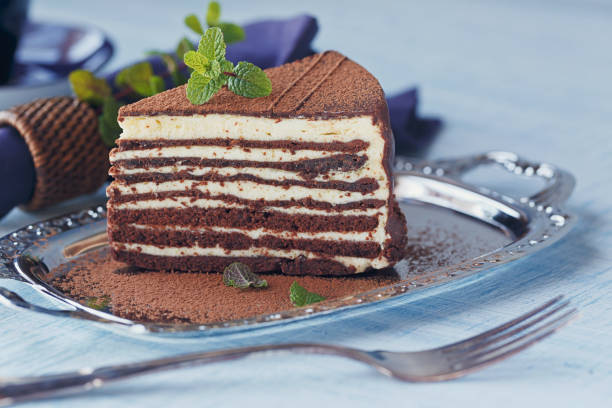 istock Slice of delicious chocolate cake on silver plate 997579598