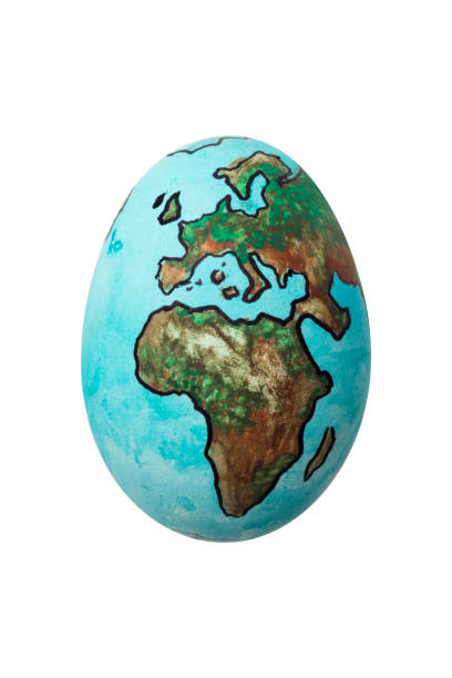 istock Planet Earth painted on an egg on isolated white background 997585246