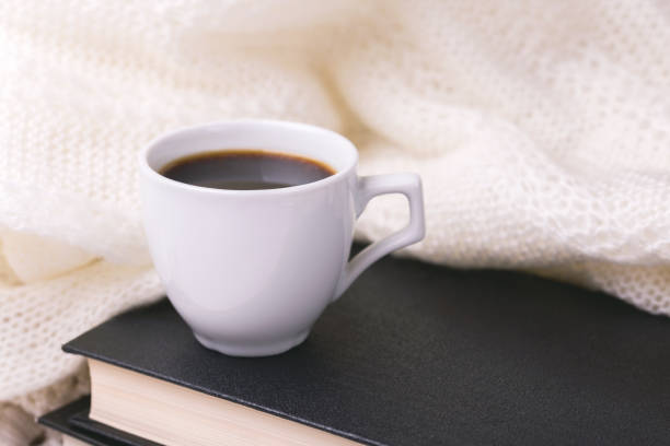 istock Coffee, plaid and books. Education concept. Selective focus 997593288