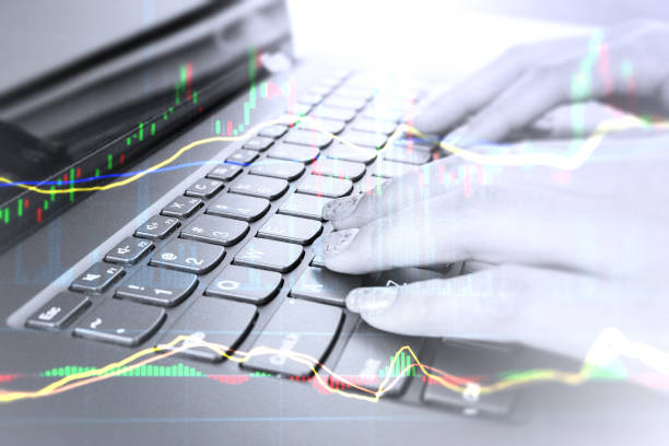 istock Technical analysis by online traders risking money gambling by day-trading. 997596222
