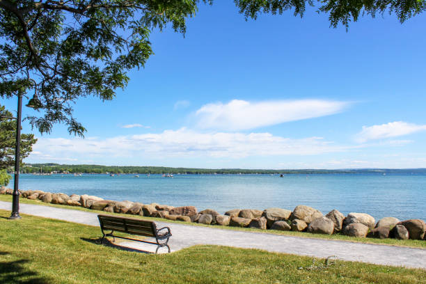 istock Bench on Canandaigua Lake shoreline 997598088