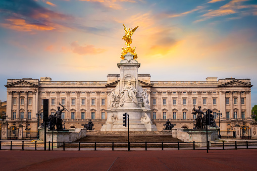 London, UK, October 10, 2018: Close-up of Buckingham Palace and cityscape at sunset sunlight, London, England.
