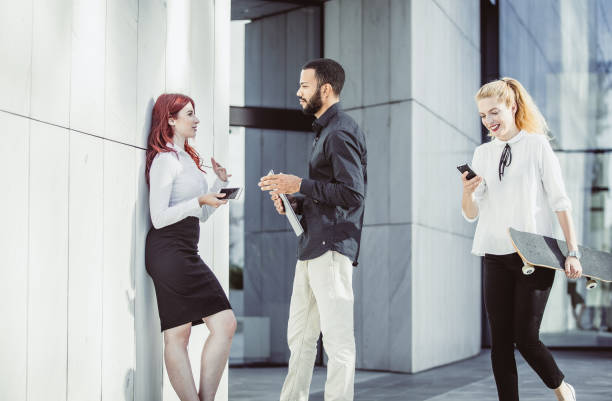 istock Business People Discussing in Front of Building 997622354