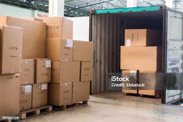 The Cartons With Loading Out Of Container Stock Photo - Download Image Now - Truck, Pallet - Industrial Equipment, Container