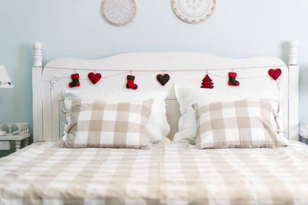 istock Picture of romantic nice decorated bed in bedroom 997628842