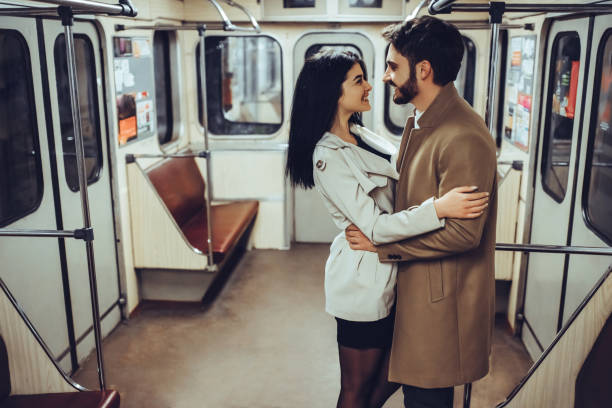 istock Young romantic couple in subway 997648058