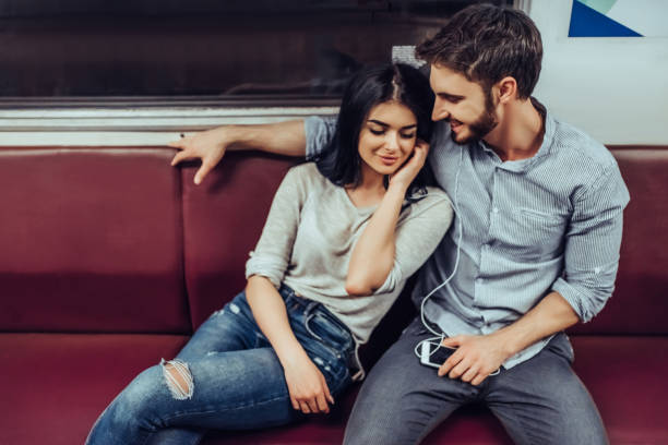 istock Young romantic couple in subway 997655572
