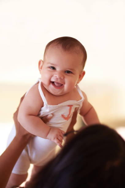 istock Mommy knows how to make her smile 997664632