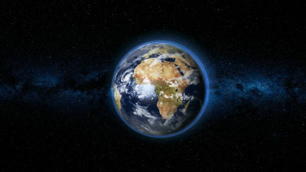 istock Realistic Earth Planet against the the star sky 997665096