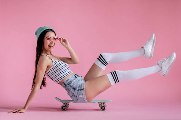 istock Young girl on pink background 997665596