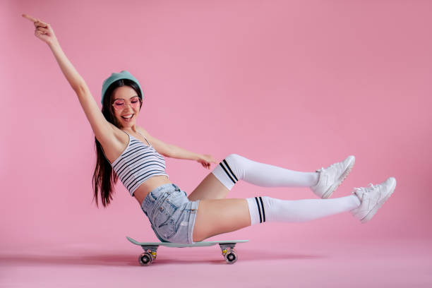 istock Young girl on pink background 997665606