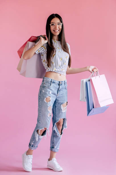 istock Young girl on pink background 997665682