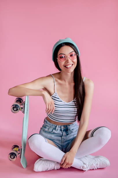 istock Young girl on pink background 997665684