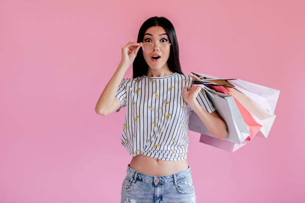 istock Young girl on pink background 997665778
