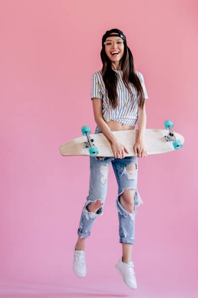 istock Young girl on pink background 997665862