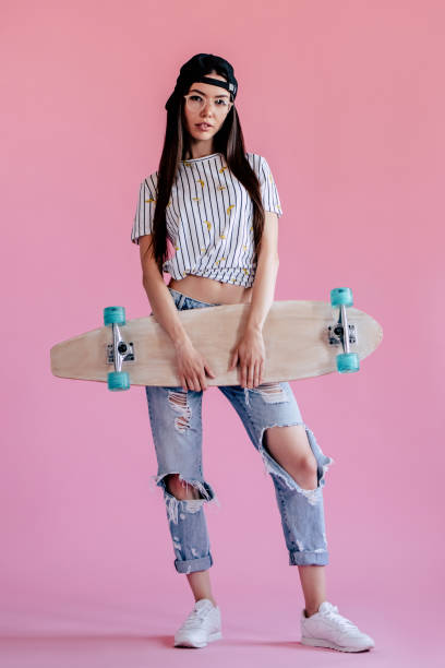 istock Young girl on pink background 997665882