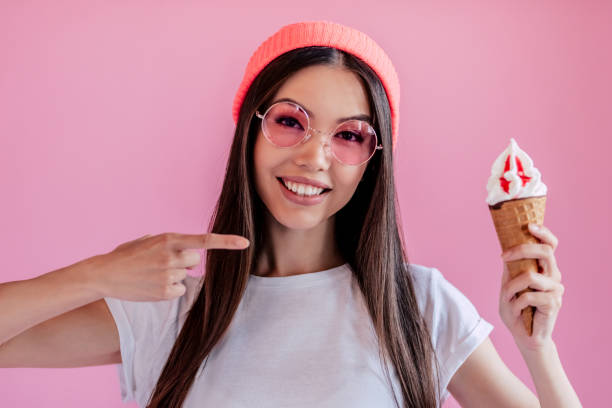istock Young girl on pink background 997666086
