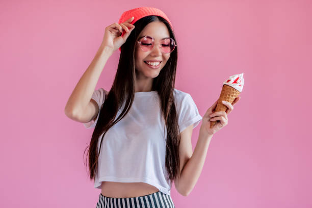 istock Young girl on pink background 997666446