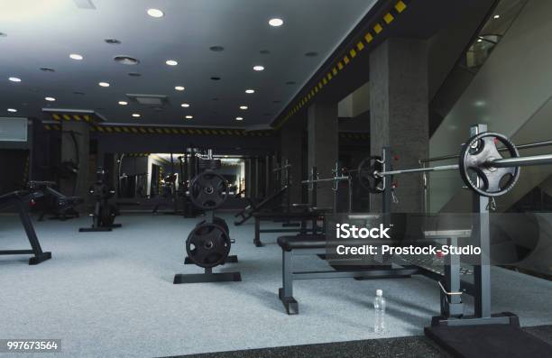 Gym Interior With Weightlifting Equipment Stock Photo - Download Image Now - Gym, Health Club, Exercising