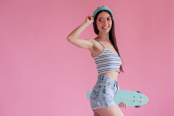 istock Young girl on pink background 997673642