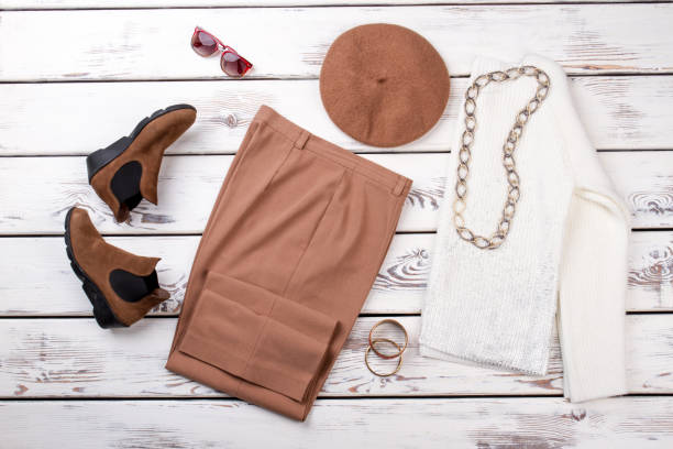 istock Fashionable women's clothes on the table. 997673984