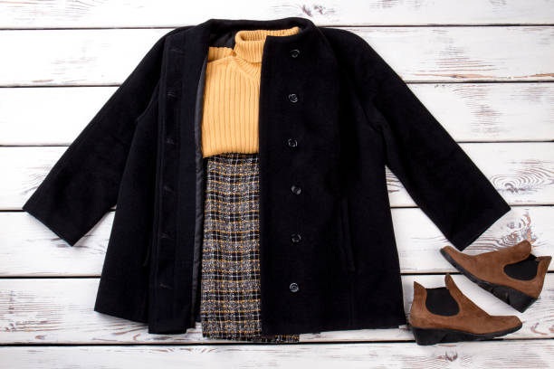 istock Winter outfit with black cashmere coat. 997678594