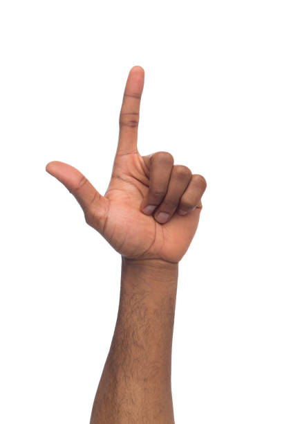 istock Black male hand with index finger pointing up, isolated 997679660