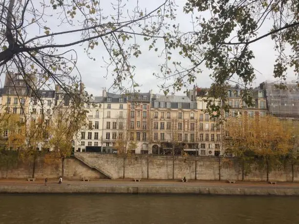 A row of buildings off the shore of the Seine in Paris, France.