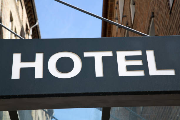 istock Hotel Sign against Building 997692194