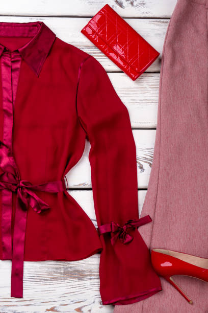 istock Close up red womens outfit and wallet. 997695134