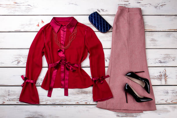 istock Long tight skirt and silk robe with accessories. 997697270