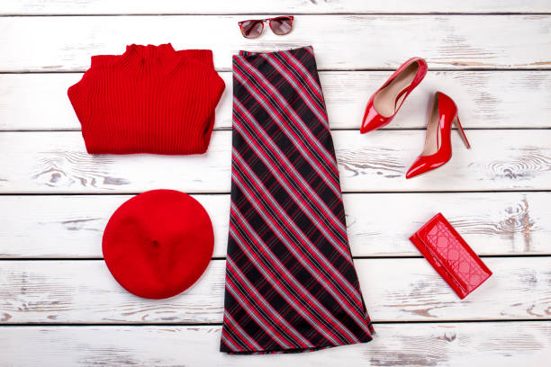 istock Red women clothing with checkered skirt. 997702436