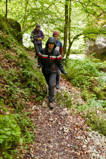 istock Group of people hiking on a trail 997710898