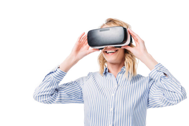 istock smiling attractive woman using virtual reality headset isolated on white 997712216