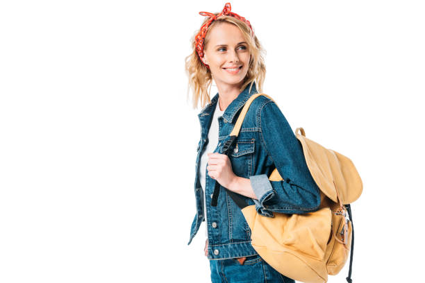 istock attractive woman with bag looking away isolated on white 997714036